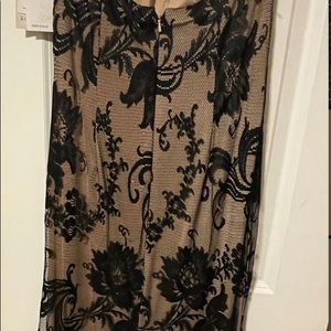 Jessica McClintock formal halter neck dress in size 8, black lace with lining.